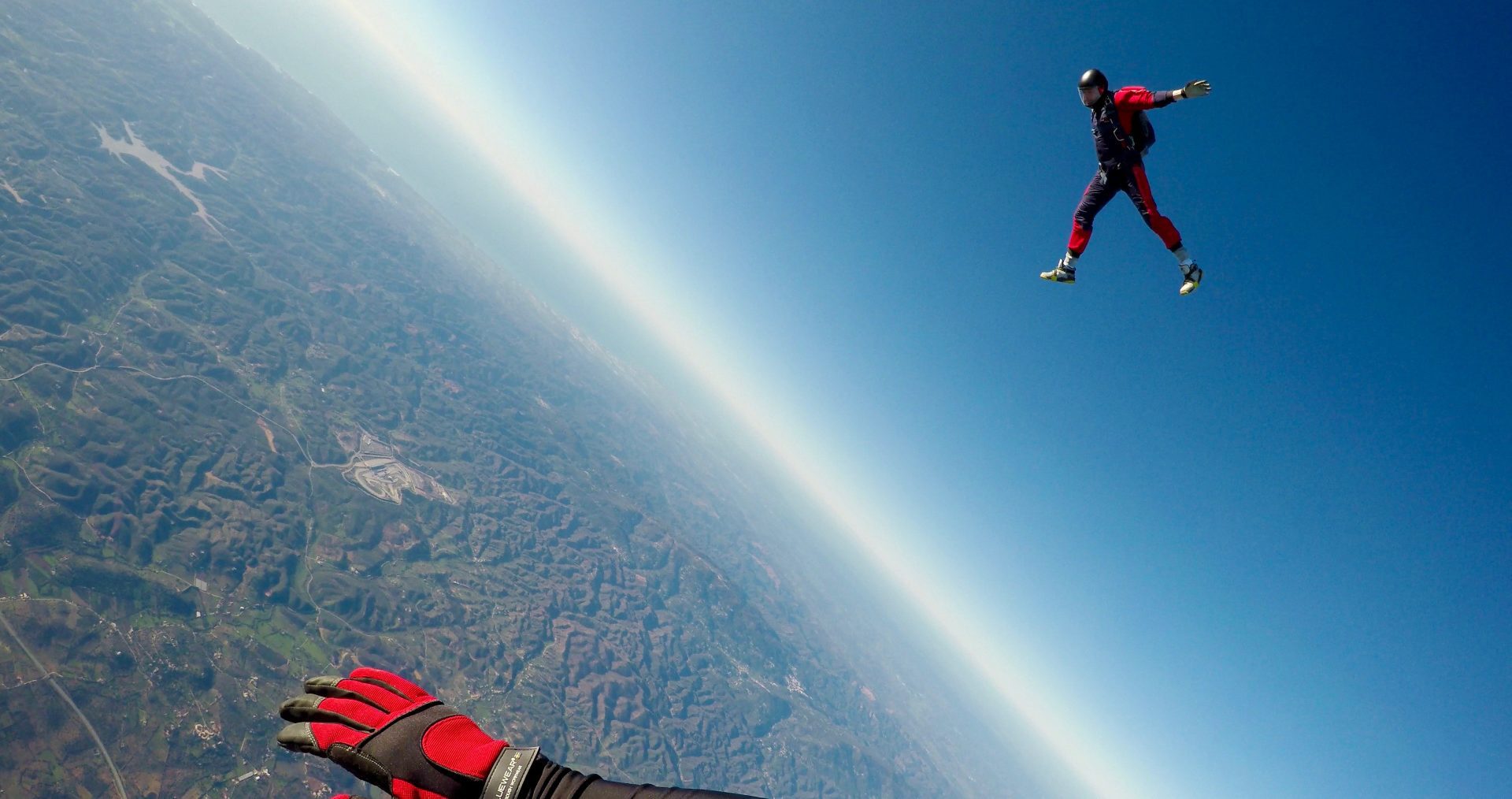 Man jumps out of plane in a skydive