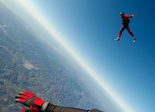 Man jumps out of plane in a skydive