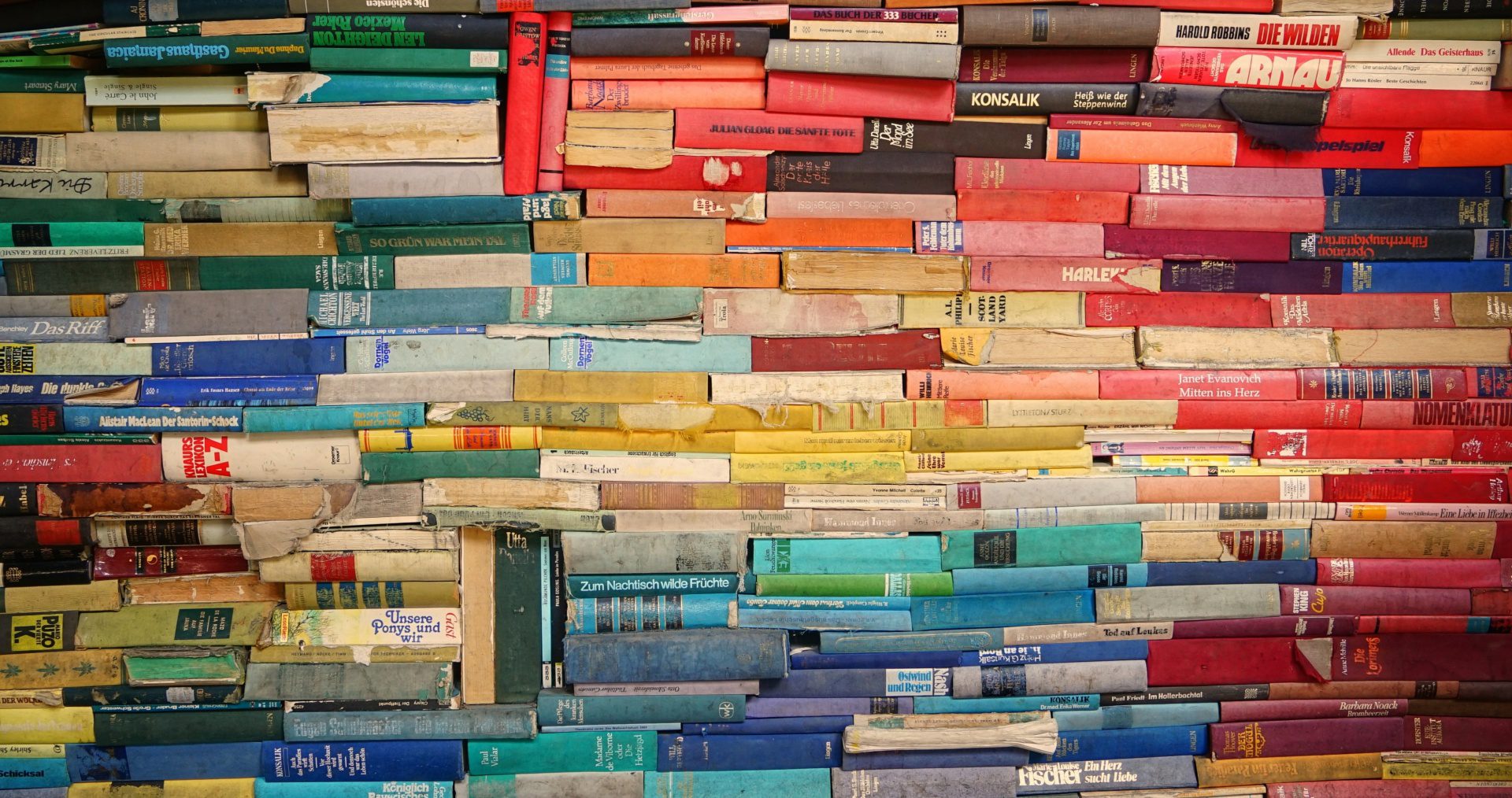 Stacks of colourful books